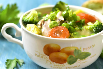 Summer soup with chicken and vegetables.