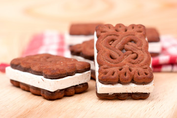 coockies with zephyr layer on wooden background
