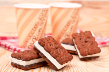 zephyr cookie with tea on wooden background