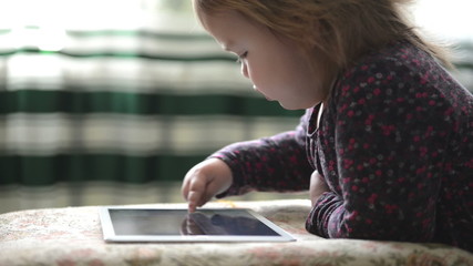 Baby 2 years old use digital tablet computer