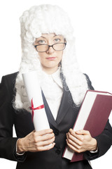 Female  judge wearing a wig with eyeglasses holding brief and book