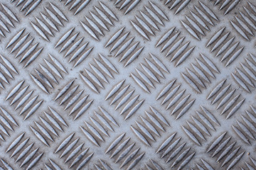 Metal rhombus shaped background / steel texture 