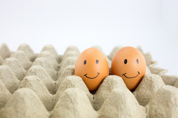 happy egg in egg tray