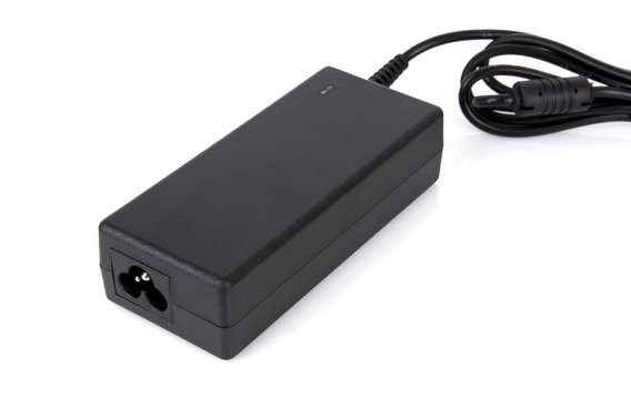 Laptop AC adapter charger Power supply isolated on white background