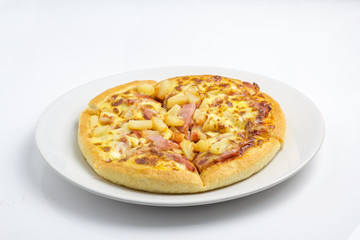 full pizza in white plate