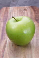 apples on a wooden board, top view, horizontal layout. fruit color image with space for writing