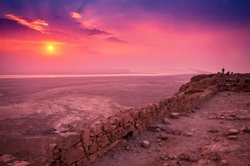 Peel and stick wallpaper Candy pink Beautiful sunrise over Masada fortress. Ruins of King Herod's palace in Judaean Desert.