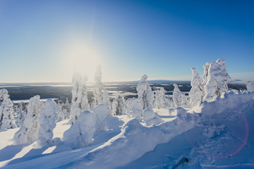 Beautiful cold mountain view of ski resort, sunny winter day with slope, piste and ski lift