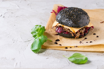Black burger with stews