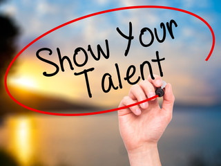 Man Hand writing Show your Talent  with black marker on visual s