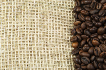 Roasted coffee beans on a linen cloth