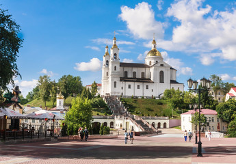 Fototapeta na wymiar Vitebsk. View of the Assumption Cathedral and the Pushkin bridge. Byelorussia
