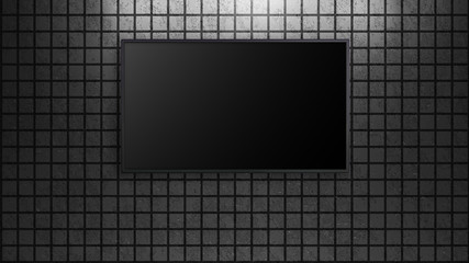 led tv display on grey square bricks wall turn off