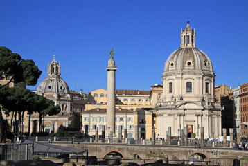 Fototapeta na wymiar ROME, ITALY - DECEMBER 21, 2012: Trajan's Forum. Trajan's Column, Santissimo Nome di Maria al Foro Traiano Church in Rome, Italy