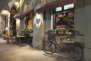 Fototapeta Poland, Krakow. Evening café in Krakow. obraz