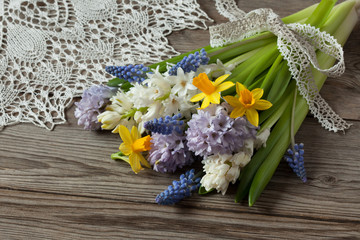 Spring bouquet of flowers hyacinths and daffodils on table © tachinskamarina