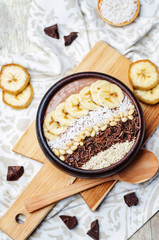 chocolate smoothie with banana, coconut, pine nuts, chocolate an