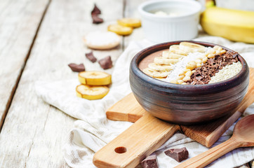 chocolate smoothie with banana, coconut, pine nuts, chocolate an