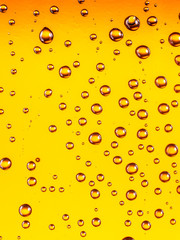 Water drops on glass of beer. Close up.