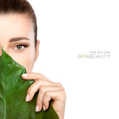 Beauty Spa Woman with a Fresh Leaf over Face