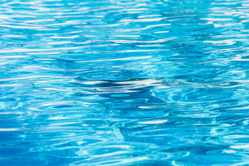 Ripples on the water in the swimming pool.