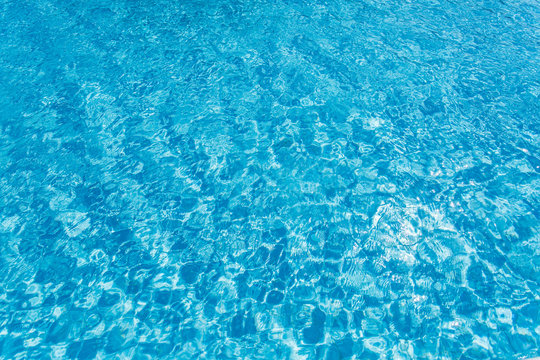 Ripples on the water in the swimming pool.