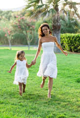 Fototapeta premium Mother and daughter are resting in the country side.