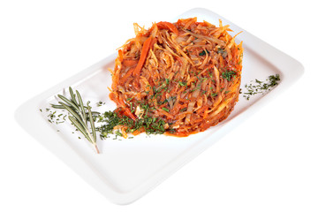Stewed cabbage on rectangular ceramic plate, studio shot, isolat