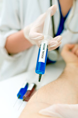 Obraz premium Doctor injecting patient with syringe. Social media addiction concept.
