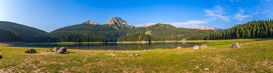 Fototapeta na wymiar Panoramic photo of the glacial Black lake located on mount Durmitor, nature in Montenegro continental part.