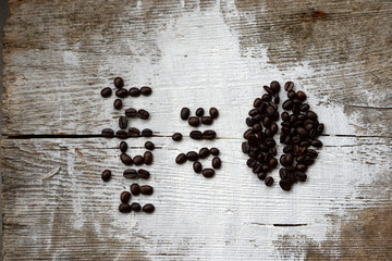 Bohnenwortspiel, aus Kaffeebohnen geschrieben
