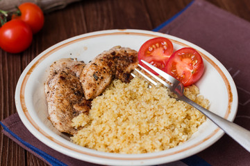 Homemade couscous with fillet grilled with herbs