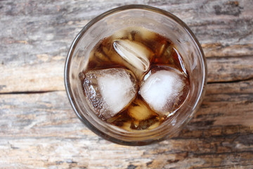 Glass of whiskey with ice