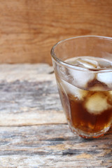 Glass of whiskey with ice