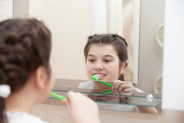 teenager with   toothbrush in   bath