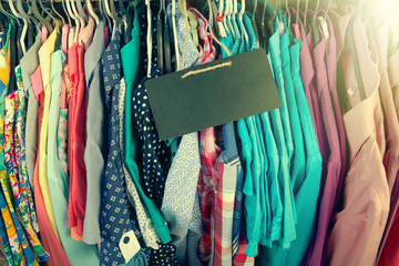 Clothes hanging on the rack in the store