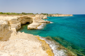 Fototapeta premium Scenic rocky cliffs of Torre Sant Andrea, Salento, Italy
