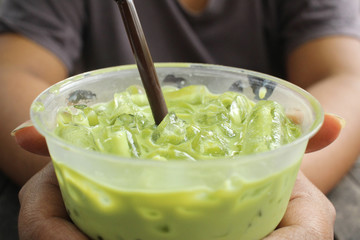 Iced green tea and milk