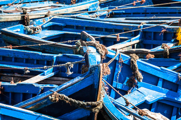 Lots of blue fishing boats in the port of Essaouira, Morocco