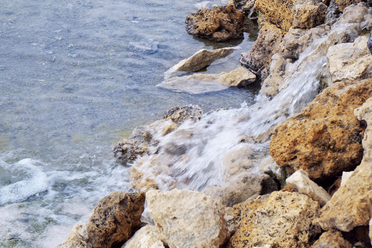 Water flowing from the stones