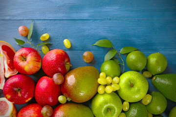 Fruits on dark blue wooden background