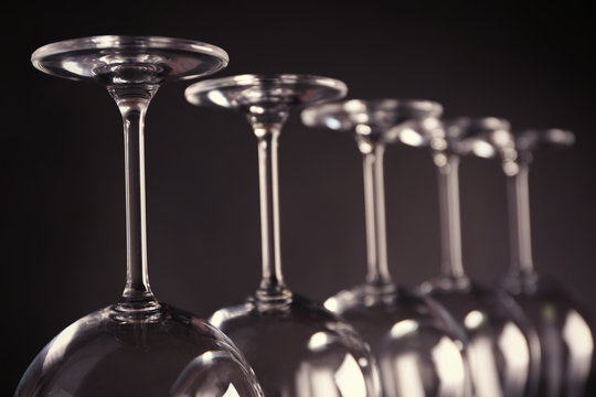 Empty wine glasses on dark background, closeup