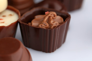 Assorted chocolate candies, close up