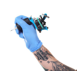 Tattooist hand in blue glove with tattoo machine isolated on white background, close up