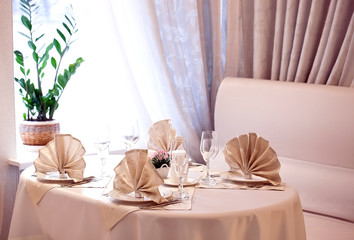 Table set for wedding or another catered event dinner.