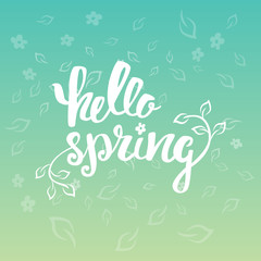 Hello Spring. Hand lettering, calligraphy inscription with spring leaves.