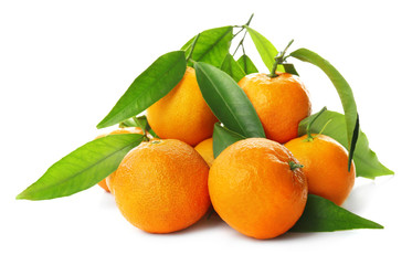 Ripe tangerines with green leaves isolated on white
