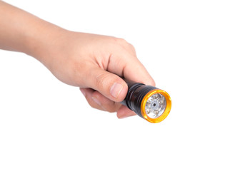 Hand holding flashlight on white background