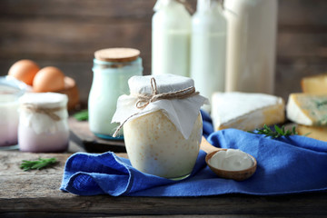 Set of dairy products on wooden table closeup