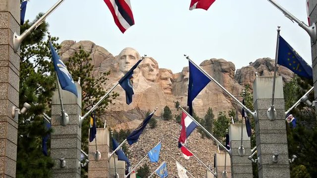 Row of flags leading to Mount Rushmore in South Dakota